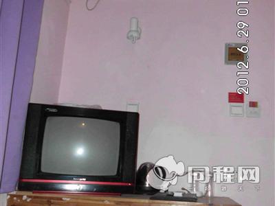 西安华宝铭族宾馆图片办公桌、电视、空调[由18967mynbie提供]
