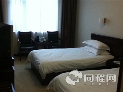 上海静安星程赣园宾馆图片客房/床[由wangyingnanme提供]