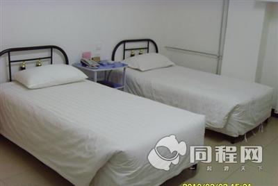 北京荣宝黄金酒店图片客房/床[由15532ogwtvx提供]