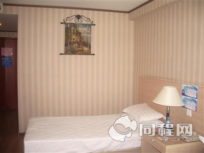 烟台格兰德商务酒店图片客房/床[由15104uykevi提供]