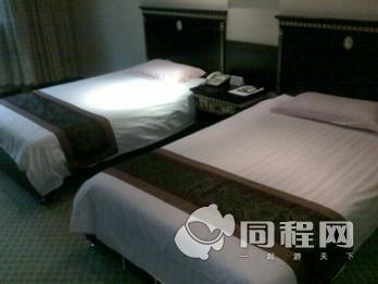 上海新纪元大酒店图片客房/床[由15001mdricf提供]
