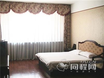 青岛万紫千红商务酒店图片标准大床房
