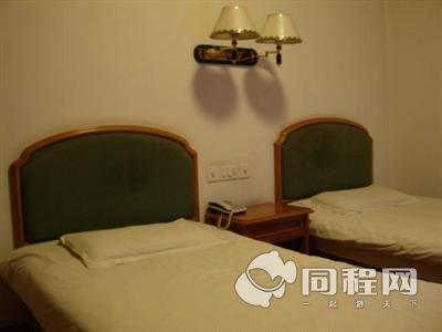 杭州锦华之旅宾馆图片客房/床[由曲奇饼干提供]
